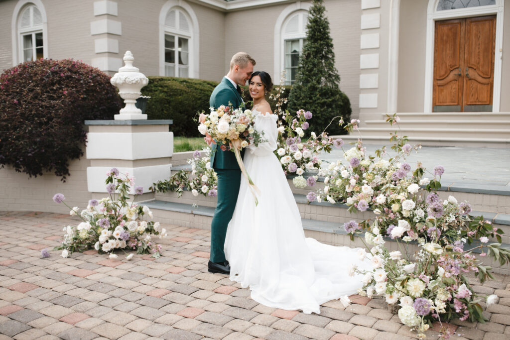 Couple posing during their wedding ceremony at Broyhill Chateau for Boone North Carolina Wedding Photographer 