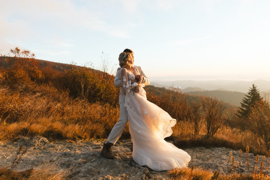 asheville elopement photographer at black balsam knob photographs couple eloping on the mountaintop