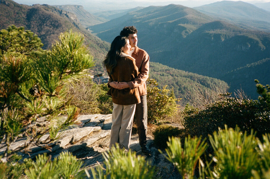 couple on hawksbill mountain for their engagement session