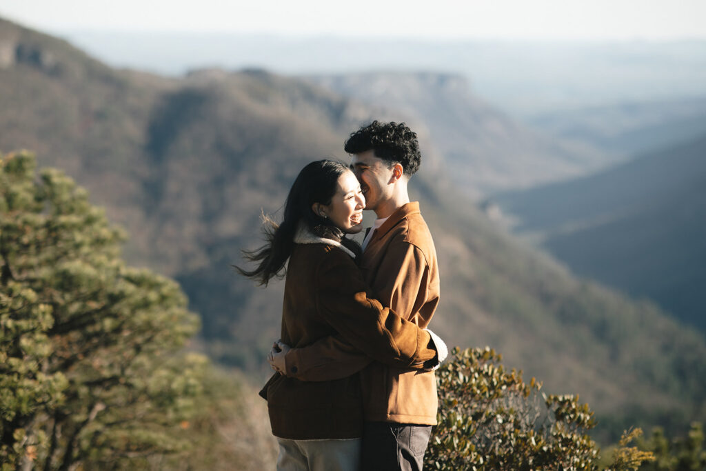 couple on hawksbill mountain during their engagement session