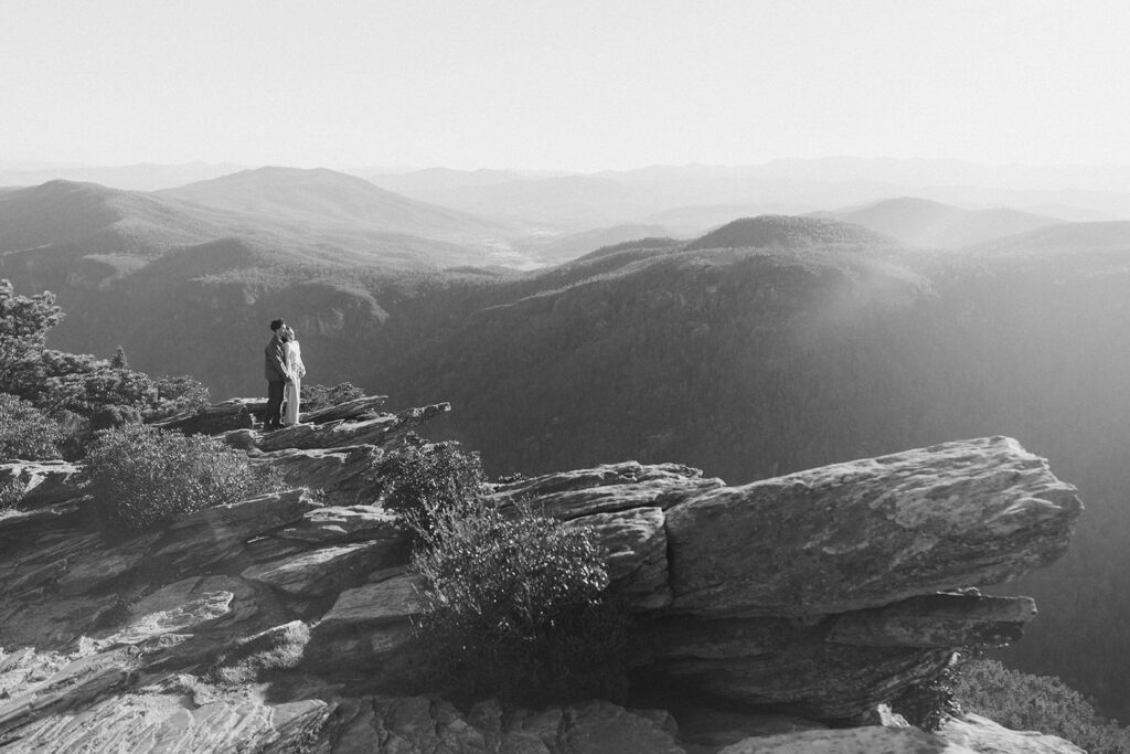 couple on hawksbill mountain during their engagement session