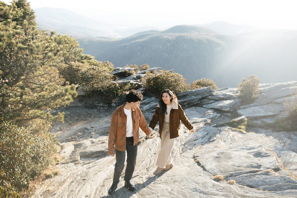 couple on hawksbill  mountain during their engagement session