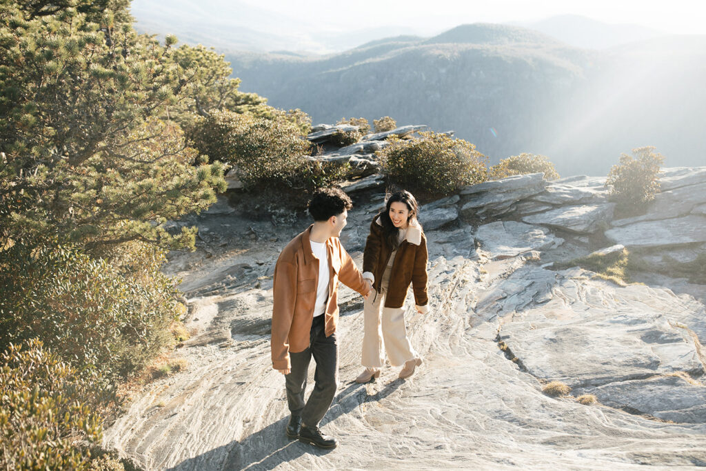 couple on hawksbill mountain during their engagement session