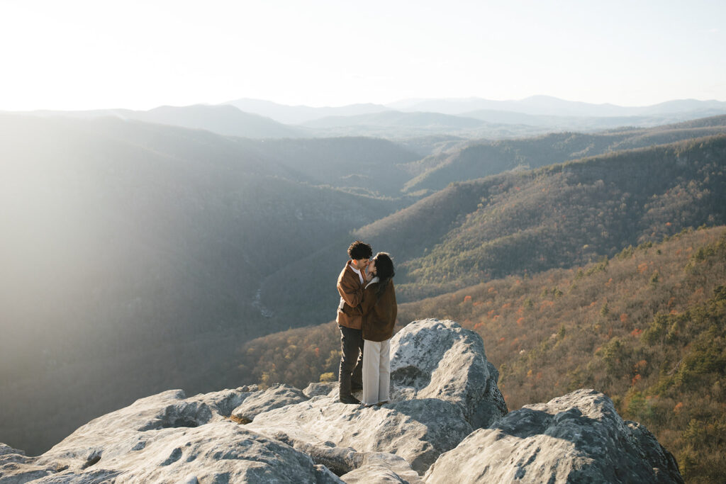 couple on hawksbill mountain during their engagement session